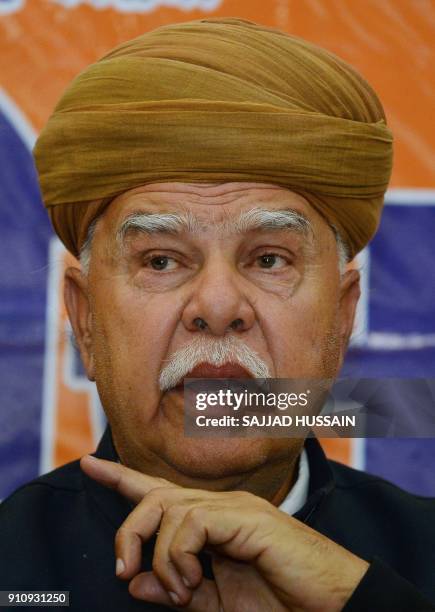 Rajput Karni Sena chief Lokendra Singh Kalvi addresses a press conference in New Delhi on January 27, 2018. Thousands of police in riot gear guarded...