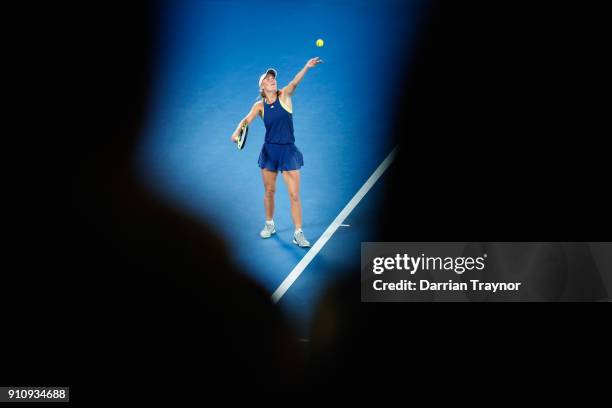 Caroline Wozniacki of Denmark serves in her women's singles final against Simona Halep of Romania on day 13 of the 2018 Australian Open at Melbourne...