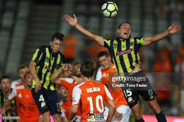 Alan Baro of the Mariners attempts to head the ball during the round 18 A-League match between the Central Coast Mariners and the Brisbane Roar at...
