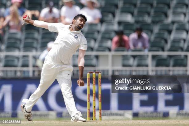 India's bowler Jasprit Bumrah delivers the ball during the fourth day of the third cricket test match between South Africa and India at Wanderers...
