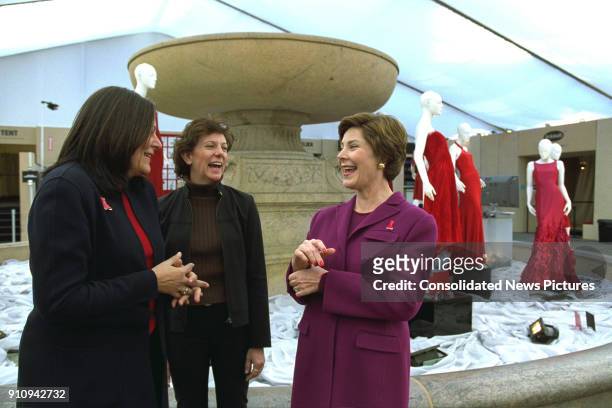 From left, Fern Mallis, of 7th on Sixth event management, Fashion Week chief of production Lynn Long, and US First Lady Laura Bush shares a laugh as...