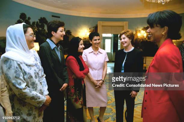 Unidentified members of the US-Afghan Women's Council meet with US First Lady Laura Bush and National Security Advisor Dr Condoleezza Rice in the...