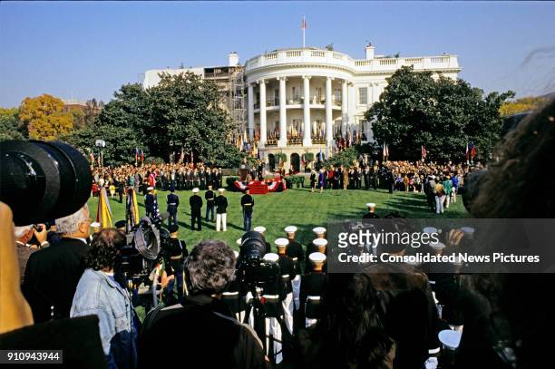 General view of the White House's South Lawn as the press, the military, an honor guard, and spectators attend US President George HW Bush host a...