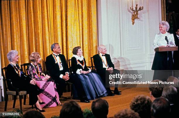 First Lady Barbara Bush speaks during a ceremony for 1989 Kennedy Center Honorees in the White House's East Room, Washington DC, December 3, 1989....