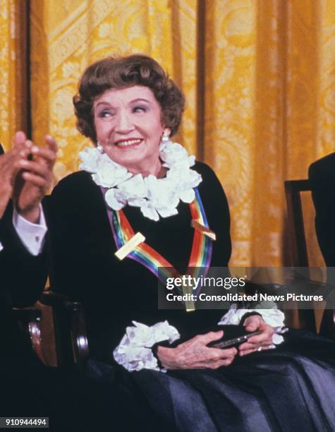View of French-born American actress Claudette Colbert during a ceremony for 1989 Kennedy Center Honorees in the White House's East Room, Washington...
