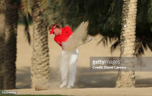 Miguel Angel Jiminez of Spain plays his second shot on the 14th hole during day three of Omega Dubai Desert Classic at Emirates Golf Club on January...