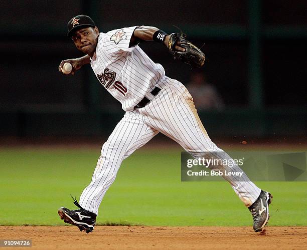 Shortstop Miguel Tejada of the Houston Astros throws to first at Minute Maid Park on September 23, 2009 in Houston, Texas. Houston won 3-0.