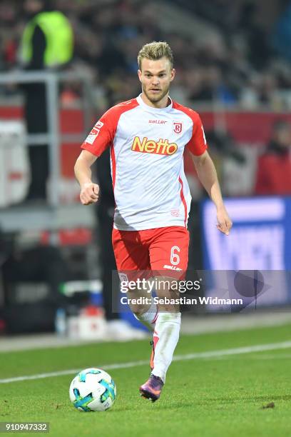 Benedikt Saller of Regensburg plays the ball during the Second Bundesliga match between SSV Jahn Regensburg and FC Ingolstadt 04 at Continental Arena...