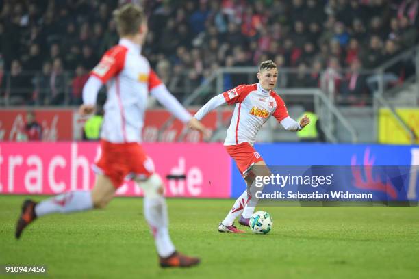 Marc Lais of Regensburg plays the ball during the Second Bundesliga match between SSV Jahn Regensburg and FC Ingolstadt 04 at Continental Arena on...