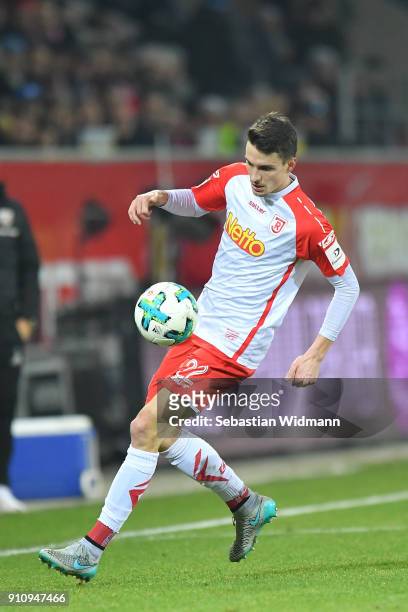 Sebastian Stolze of Regensburg plays the ball during the Second Bundesliga match between SSV Jahn Regensburg and FC Ingolstadt 04 at Continental...