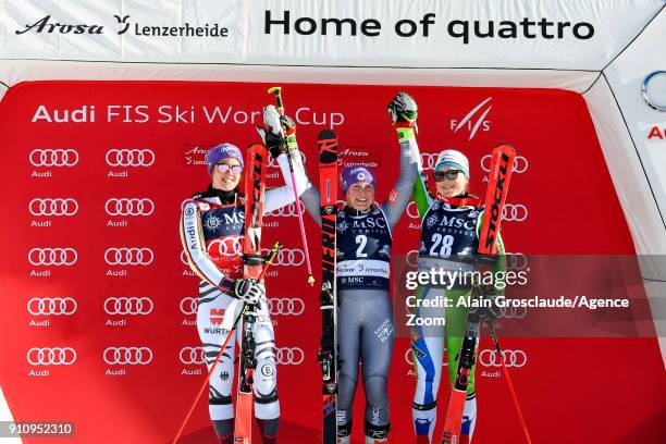 Viktoria Rebensburg of Germany takes 2nd place, Tessa Worley of France takes 1st place, Meta Hrovat of Slovenia takes 3rd place during the Audi FIS...