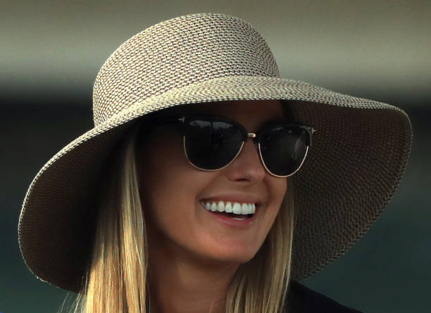 Erica Stoll, wife of Rory McIlroy of Northern Ireland, looks on during the third round of the Omega Dubai Desert Classic at Emirates Golf Club on...