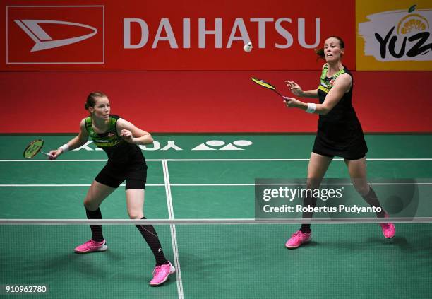 Kamilla Rytter Juhl and Christinna Pedersen of Denmark competes against Misaki Matsutomo and Ayaka Takahashi of Japan during the Women's Doubles Semi...