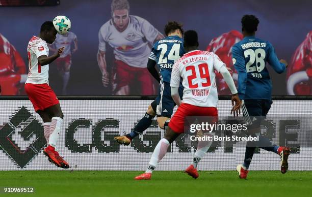 Bruma of RB Leipzig scores his team's first goal with a header during the Bundesliga match between RB Leipzig and Hamburger SV at Red Bull Arena on...