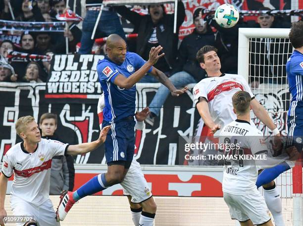 Schalke's Brazilian defender Naldo heads the ball before scoring the opening goal during the German first division Bundesliga football match VfB...