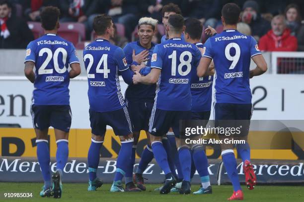 Amine Harit of Schalke celebrates his team's second goal with team mates during the Bundesliga match between VfB Stuttgart and FC Schalke 04 at...