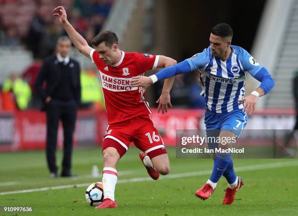 Jonny Howson of Middlesbrough is challenged by Biram Kayal of Brighton and Hove Albion during The Emirates FA Cup Fourth Round match between...