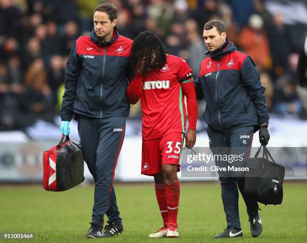 Renato Sanches of Swansea City walks off the pitch following an injury during The Emirates FA Cup Fourth Round match between Notts County and Swansea...