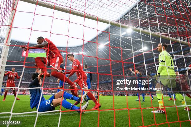 Jerome Boateng of Bayern Muenchen celebrates after he scored a goal to make it 2:2 during the Bundesliga match between FC Bayern Muenchen and TSG...