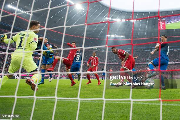 Jerome Boateng of Bayern Muenchen scores a goal to make it 2:2 during the Bundesliga match between FC Bayern Muenchen and TSG 1899 Hoffenheim at...