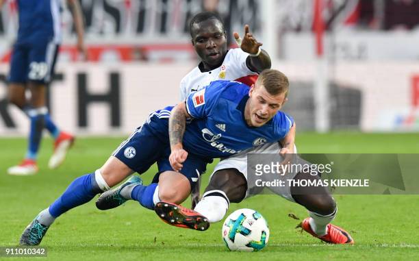 Stuttgart's Congolese forward Chadrac Akolo and Schalke's midfielder Max Meyer vie for the ball during the German first division Bundesliga football...