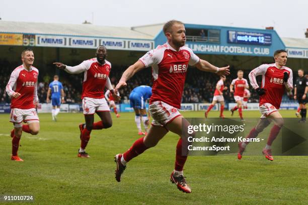 Fleetwood Town's Paddy Madden celebrates with his team mates after scoring their first goal during the Sky Bet League One match between Gillingham...