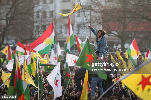 Protestors take part in a mass demonstration against the ongoing ??Turkish military campaign in the Kurdish-held Syrian enclave of Afrin, in Cologne,...