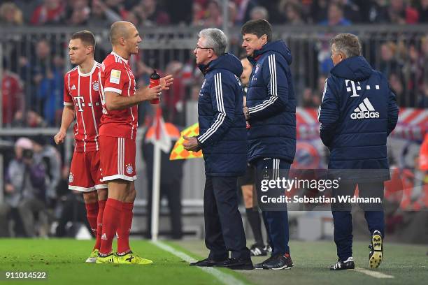 Arjen Robben of Bayern Muenchen talks to Jupp Heynckes, head coach of Bayern Muechen, during the Bundesliga match between FC Bayern Muenchen and TSG...