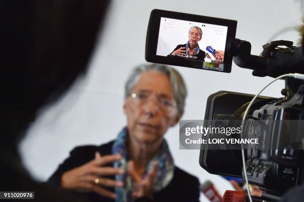 French Transport minister Elisabeth Borne gives a press conference on January 27, 2018 at the Nantes-Atlantique airport in Bouguenais, outside...