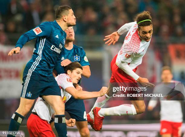 Leipzig´s Danish forward Yussuf Poulsen , Austrian forward Marcel Sabitzer , Hamburg's Greek defender Kyriakos Papadopoulos and Dutch defender Rick...