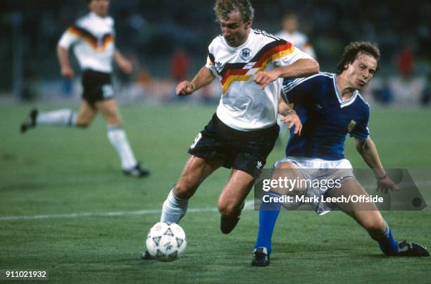 World Cup Final ; Argentina v West Germany - Rudi Voeller of Germany is fouled by Roberto Sensi of Argentina leading to the decisive penalty kick .
