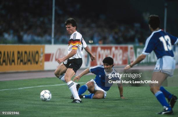 World Cup Final ; Argentina v West Germany - Diego Maradona of Argentina tackles Lothar Matthaeus of Germany .