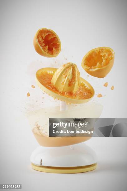 orange juice explosion - liquid solution stock pictures, royalty-free photos & images