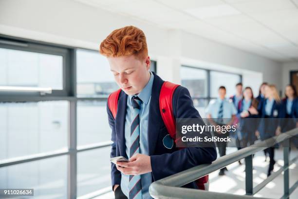 rothaarige männer am telefon - school tie stock-fotos und bilder