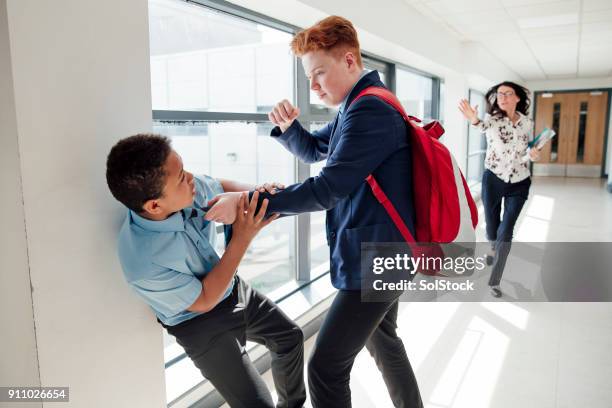 bullying at school - schoolboy stock pictures, royalty-free photos & images