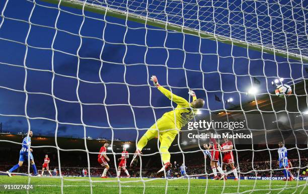 The ball goes past Darren Randolph of Middlesborough after it has ricochet off Glenn Murray of Brighton and Hove Albion during the The Emirates FA...