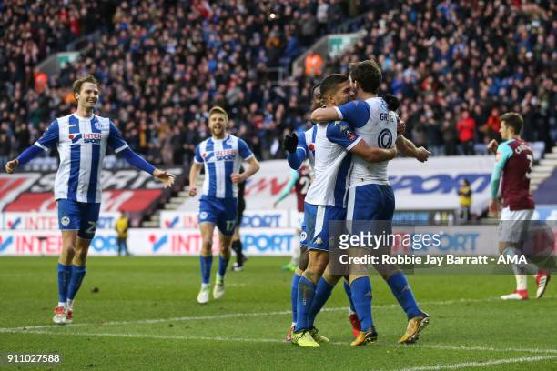 Will Grigg of Wigan Athletic celebrates after scoring a goal to make it 2-0 during the The Emirates FA Cup Fourth Round match between Wigan Athletic...
