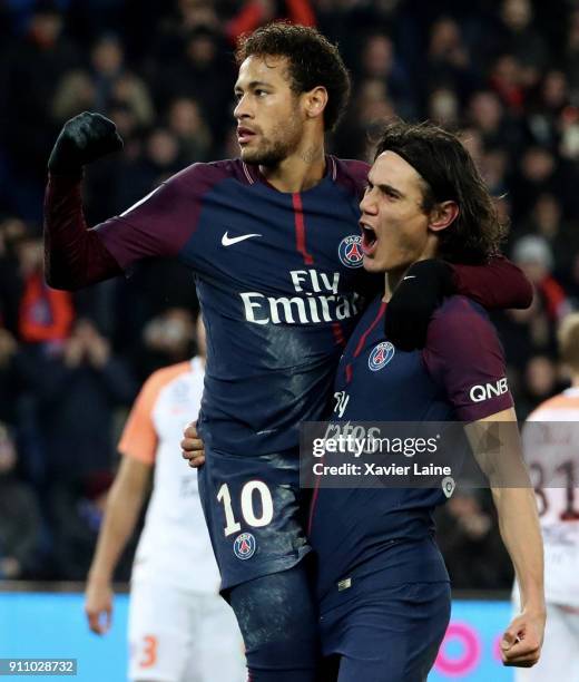 Neymar Jr of Paris Saint-Germain celebrates his goal with team-mate Edinson Cavani during the Ligue 1 match between Paris Saint-Germain and...