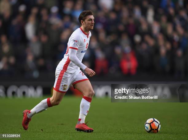 Alex Gilbey of Milton Keynes Dons runs with the ball during the Emirates FA Cup Fourth Round match between Milton Keynes Dons and Coventry City at...