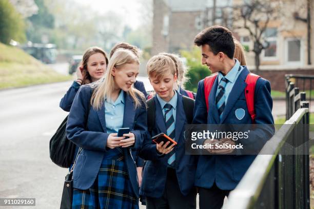 home time - school uniform stock pictures, royalty-free photos & images