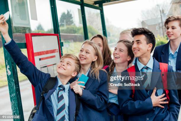 taking a selfie - bus stop uk stock pictures, royalty-free photos & images