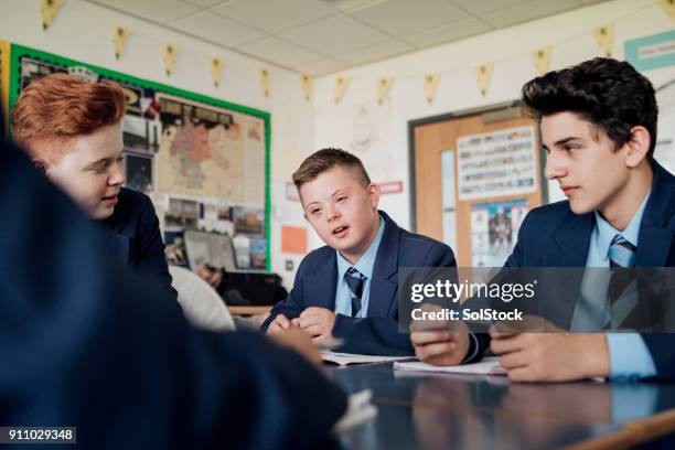 discussing in class - down syndrome stock pictures, royalty-free photos & images