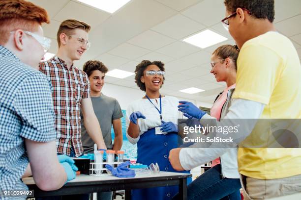 group demonstration - chemistry class stock pictures, royalty-free photos & images