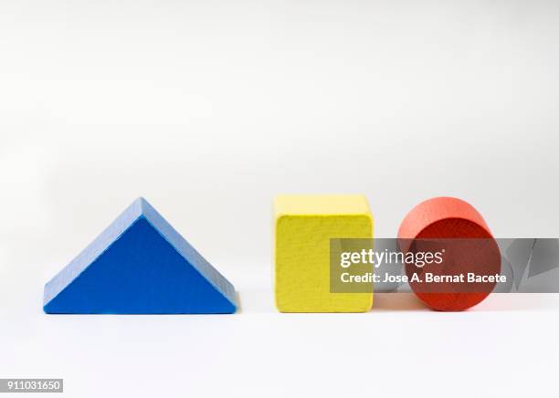 group of objects of different geometric forms of wood, triangle, bucket, cylinder and rectangle on a white background. - building block isolated stock pictures, royalty-free photos & images