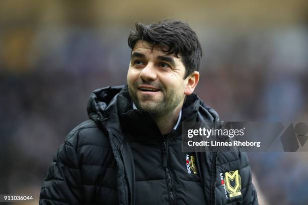 Dan Micciche, Manager of Milton Keynes Dons looks on prior to The Emirates FA Cup Fourth Round match between Milton Keynes Dons and Coventry City at...