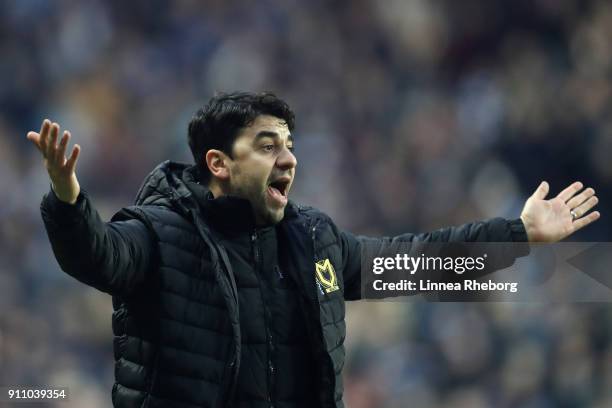 Dan Micciche, Manager of Milton Keynes Dons reacts during The Emirates FA Cup Fourth Round match between Milton Keynes Dons and Coventry City at...