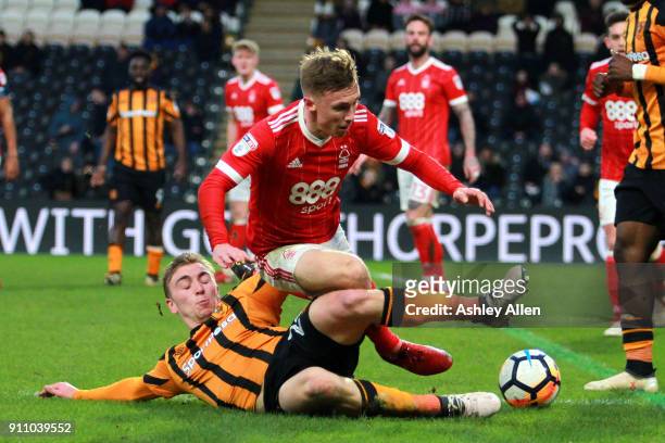 Hull City's Jarrod Bowen tackles Nottingham Forest's Matt Mills during the Emirates FA Cup Fourth Round match between Hull City and Nottingham Forest...