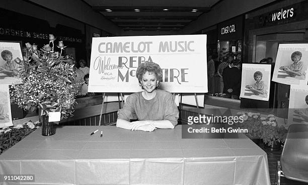 Country Music Singer Reba McEntire waits to sign autographs at the Camalot Music Store in Rivergate Mall in October 02, 1986 Nashville ,Tennessee.