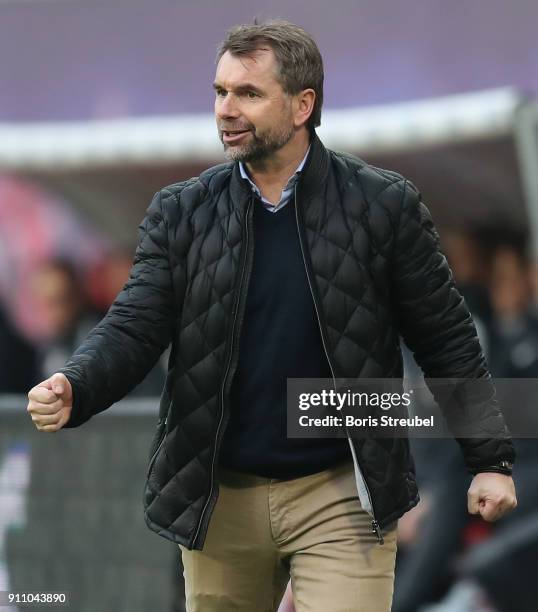 Head coach Bernd Hollerbach of Hamburger SV celebrates during the Bundesliga match between RB Leipzig and Hamburger SV at Red Bull Arena on January...