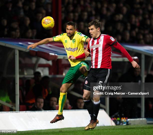 Norwich City's Moritz Leitner vies for possession with Brentford's Andreas Bjelland during the Sky Bet Championship match between Brentford and...